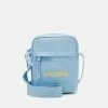 Lacoste UNISEX EXCLUSIVE - Across Body Bag - Light Blue -Lacoste Sales Store 016c9a7978de48bea57dbaa1410f28e2