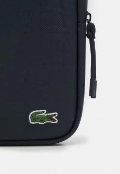 Lacoste FLAT CROSSOVER BAG - Across Body Bag - Light Adriatic Blue -Lacoste Sales Store 043efa65974c4675bc48e657a5b9306a