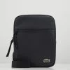 Lacoste FLAT CROSSOVER BAG - Across Body Bag - Noir -Lacoste Sales Store 1aabf811b36b4dd2b477f5a1dac5ea25