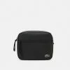 Lacoste UNISEX - Across Body Bag - Noir -Lacoste Sales Store 23c96fd52c0c40f690e0c5cdbd499d44