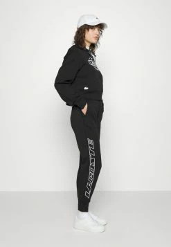Lacoste EXCLUSIVE - Tracksuit Bottoms - Black -Lacoste Sales Store 2528ced84d8c48e1a54fecb79ef20428