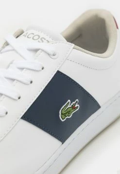 Lacoste CARNABY - Trainers - White/navy -Lacoste Sales Store 31211cb5bce6450f9670273a25205c34