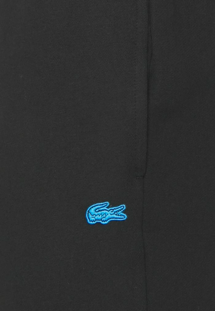 Lacoste UNISEX EXCLUSIVE - Tracksuit Bottoms - Black 8 Lacoste UNISEX EXCLUSIVE - Tracksuit Bottoms - Black - Image 6