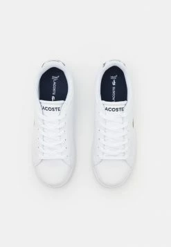 Lacoste CARNABY EVO UNISEX - Trainers - White/navy -Lacoste Sales Store 44a1b14ce08b459f91881010cb2ecbb0