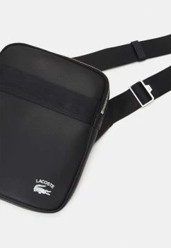 LACOSTE PRACTICE S CAMERA BAG UNISEX - Across Body Bag - Noir -Lacoste Sales Store 48b05c114ad346ffb6a9eaa4a4ce7345