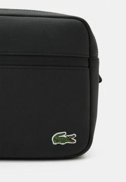 Lacoste UNISEX - Across Body Bag - Noir -Lacoste Sales Store 79983d2fc0cb477295afad8d531e596d