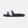 Lacoste CROCO SLIDE - Mules - Navy/white -Lacoste Sales Store 861be281c51c4691a26a4cbcee61020d