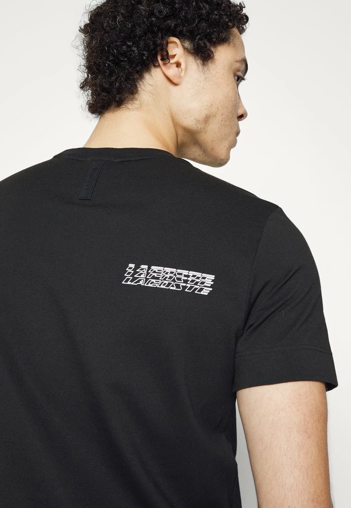 Lacoste EXCLUSIVE - Print T-shirt - Black 8 Lacoste EXCLUSIVE - Print T-shirt - Black - Image 6