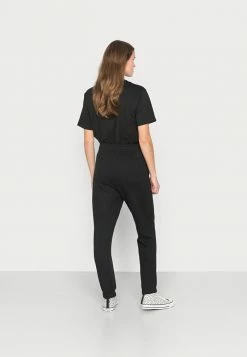 Lacoste EXCLUSIVE - Tracksuit Bottoms - Black -Lacoste Sales Store 8f26f2af8531417dbdbce9b9fb6034c5