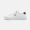 Lacoste GRIPSHOT UNISEX - Trainers - White/black -Lacoste Sales Store 979c5248a98346c886b9216d2638a26e