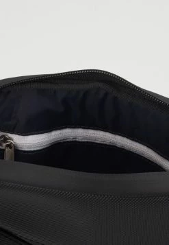 Lacoste FLAT CROSSOVER BAG - Across Body Bag - Noir -Lacoste Sales Store a14b7182c0c84b2cb5cae207ab3b2687