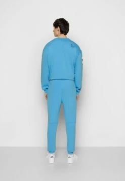 Lacoste Tracksuit Bottoms - Argentine -Lacoste Sales Store a528f61a6815419ea6fff47ed2658b9c