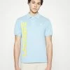 Lacoste EXCLUSIVE - Polo Shirt - Light Blue -Lacoste Sales Store b3119ad3866e4357a548fa281ec9aeff