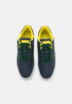 Lacoste T-CLIP UNISEX - Trainers - Navy/green -Lacoste Sales Store b8b07a4894e9484cb162330f6076936a
