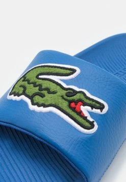 Lacoste CROCO SLIDE - Mules - Blue/green