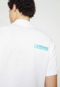 Lacoste EXCLUSIVE - Polo Shirt - White -Lacoste Sales Store cd34d0f7098047ab9971ec8d21164f9c