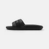 Lacoste CROCO SLIDE - Mules - Black -Lacoste Sales Store d5a9ce7a88b94c3e84f60456292c6009
