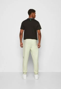 Lacoste Tracksuit Bottoms - Light Yellow 12 Lacoste Tracksuit Bottoms - Light Yellow -Lacoste Sales Store d8cc3bff43f546c4b9e1ef9dcd250896