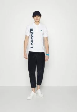 Lacoste EXCLUSIVE - Polo Shirt - White -Lacoste Sales Store dd87bd8130814b29af497790c8022b57