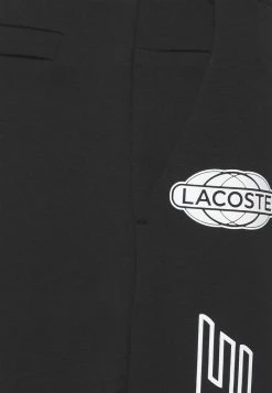 Lacoste EXCLUSIVE - Tracksuit Bottoms - Black -Lacoste Sales Store e2aac9367e0e4c19916047408c0f54a3