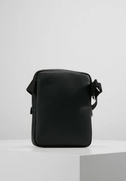 Lacoste FLAT CROSSOVER BAG - Across Body Bag - Black -Lacoste Sales Store fa891b2c212844eea53286ec395482f8