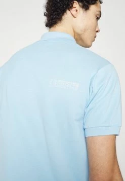 Lacoste EXCLUSIVE - Polo Shirt - Light Blue -Lacoste Sales Store fe0a306b977e4349a96ca912c8afd691