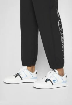 Lacoste EXCLUSIVE COURT CAGE - Trainers - White/light Blue -Lacoste Sales Store fe8cc85ba2884dda93318100a03c260a